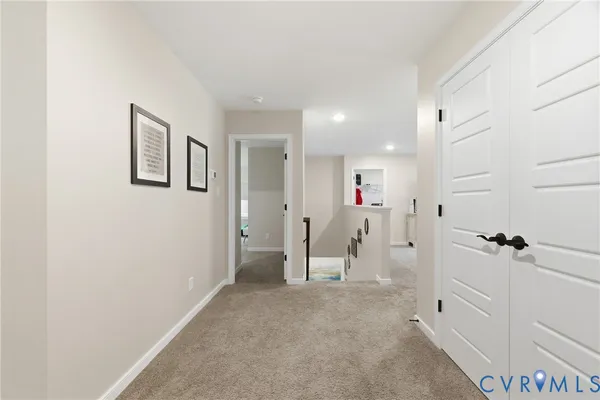 a view of a hallway with closet