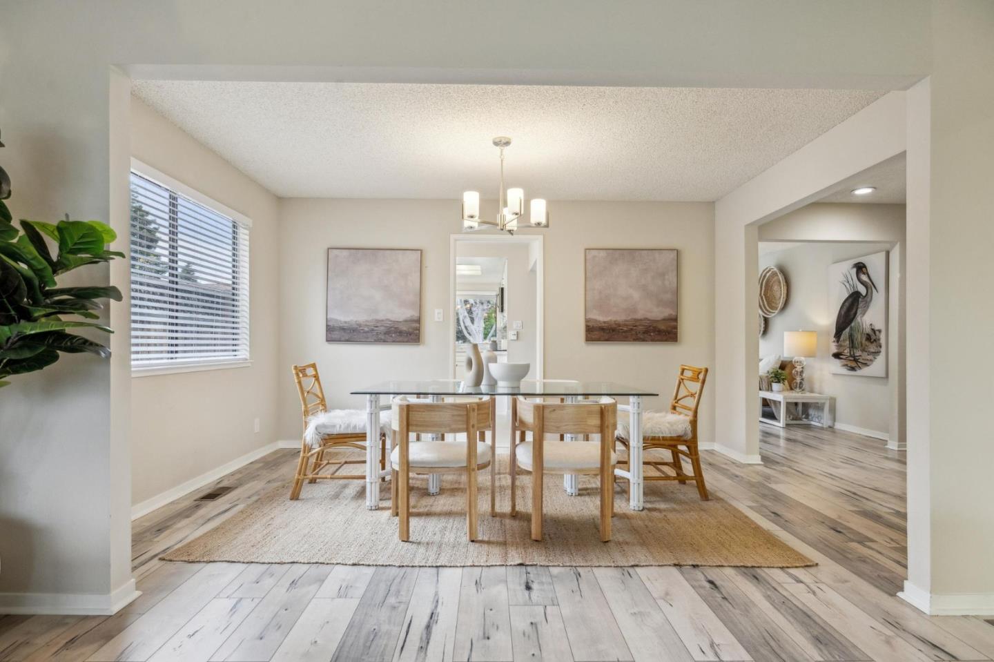 225 Arundel Road Burlingame, CA 94010 - Photo 14 of 58 a view of a dining room with furniture and wooden floor