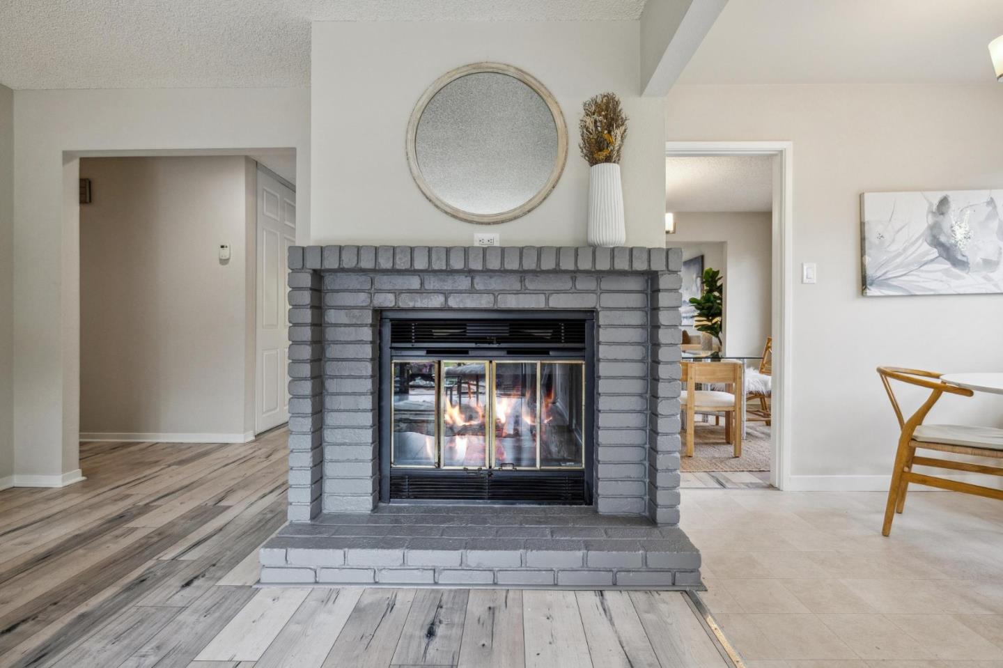 225 Arundel Road Burlingame, CA 94010 - Photo 24 of 58 a living room with furniture and a fireplace