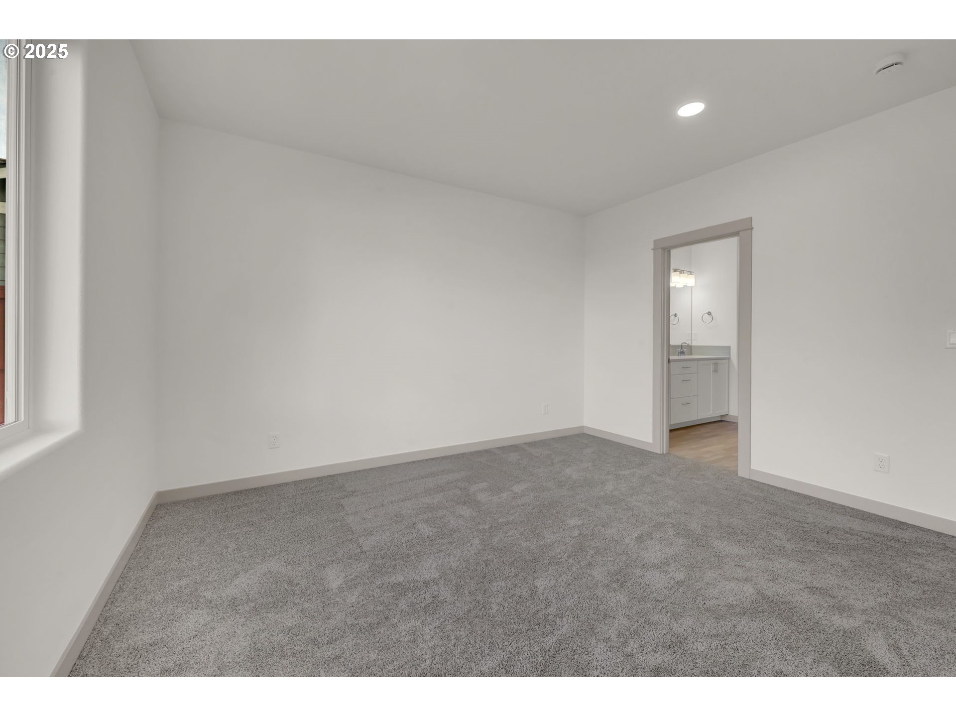 5645 Magnificence Way Eugene, OR 97402 - Photo 13 of 38 a view of an empty room and window