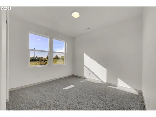 a view of an empty room with window