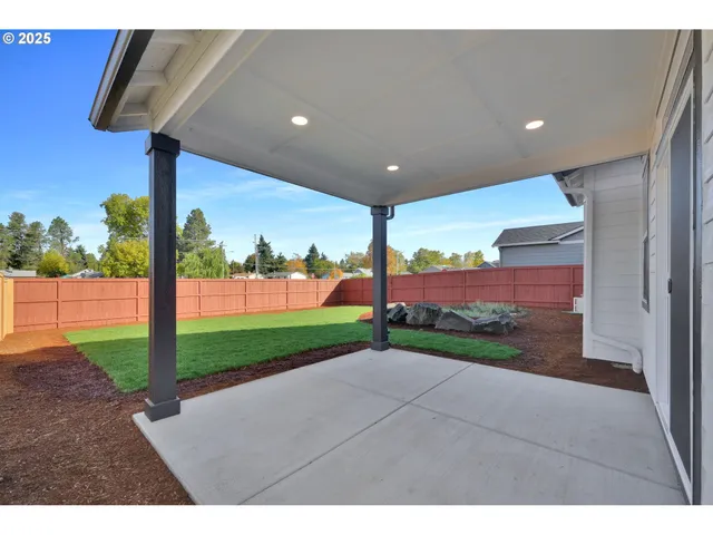 a view of a road with yard