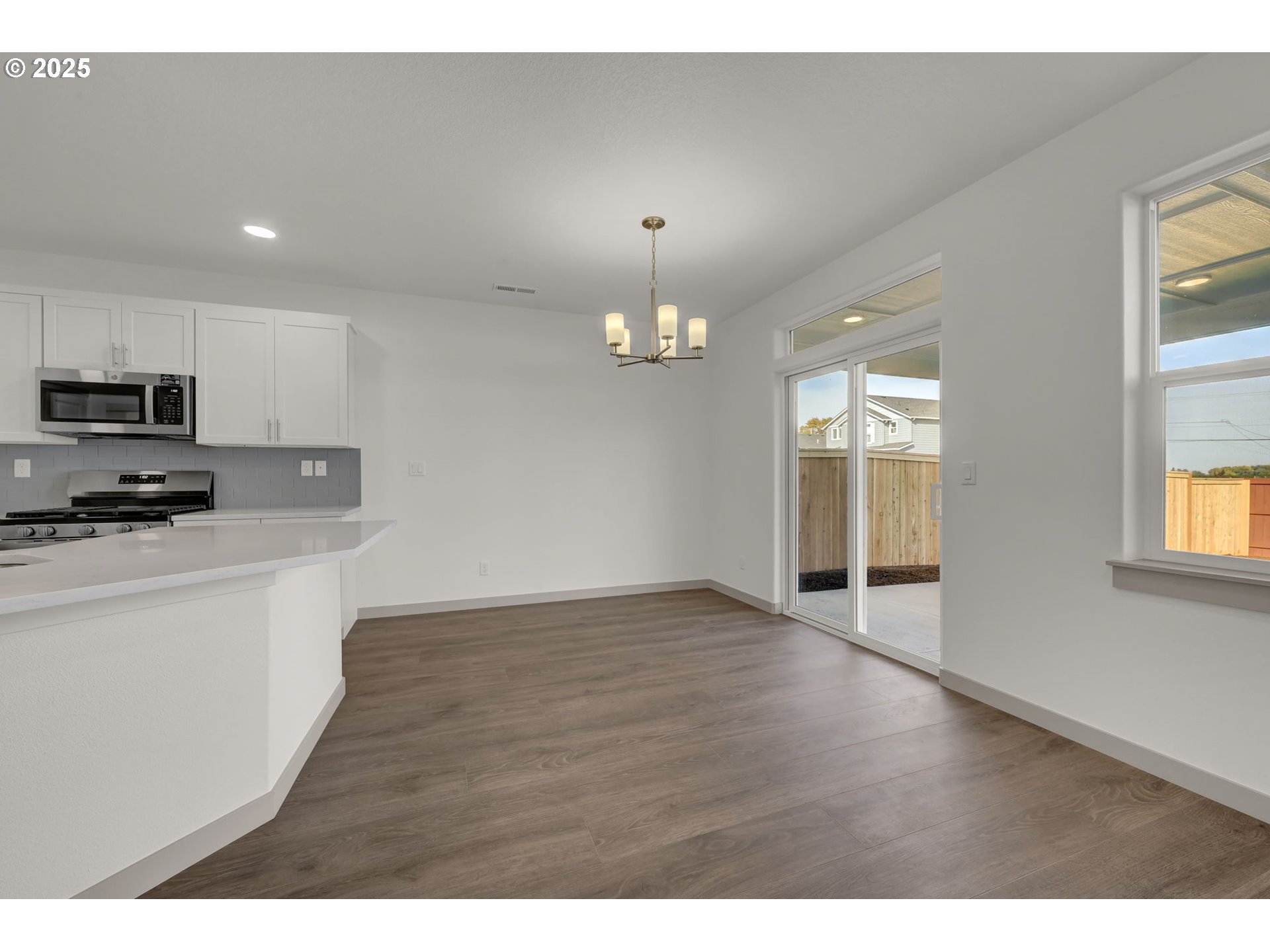 5645 Magnificence Way Eugene, OR 97402 - Photo 4 of 38 a view of an empty room and window