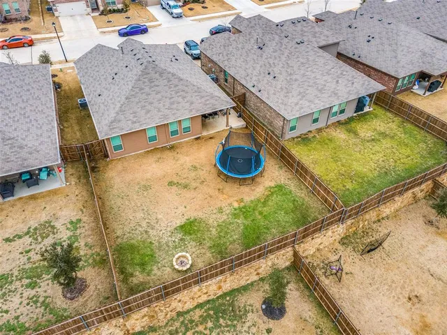 a picture of a bench in front of a wall