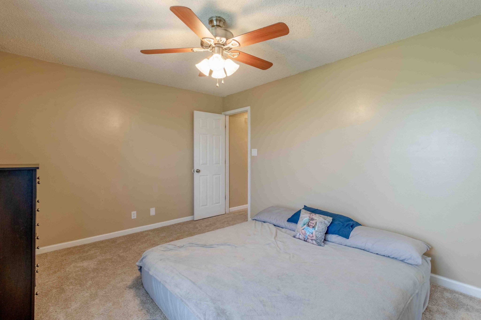 145 Bumpus Mill Road Oak Grove, KY 42262 - Photo 16 of 31 a bedroom with a bed and a ceiling fan