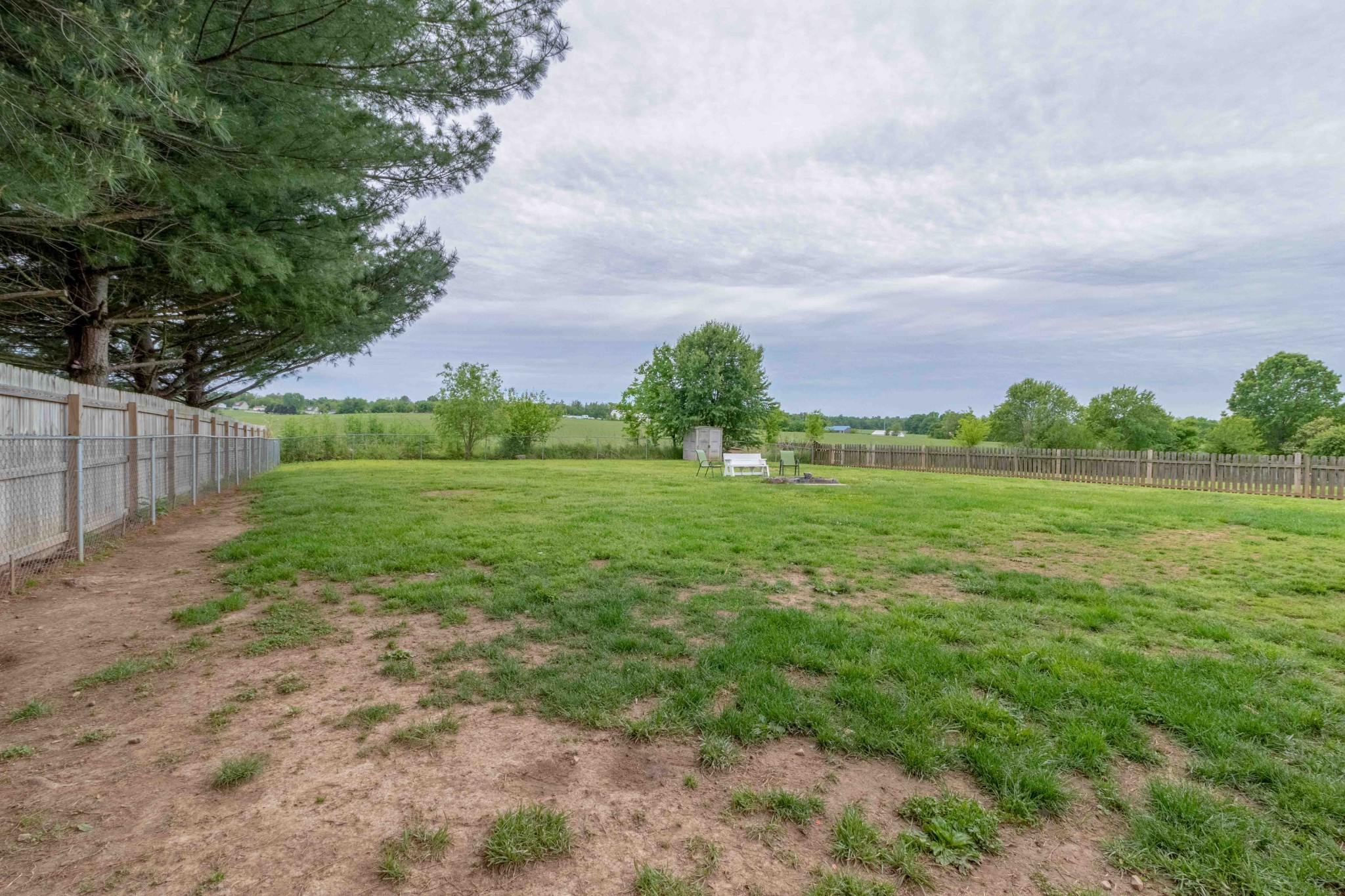 145 Bumpus Mill Road Oak Grove, KY 42262 - Photo 24 of 31 a backyard of a house with lots of green space
