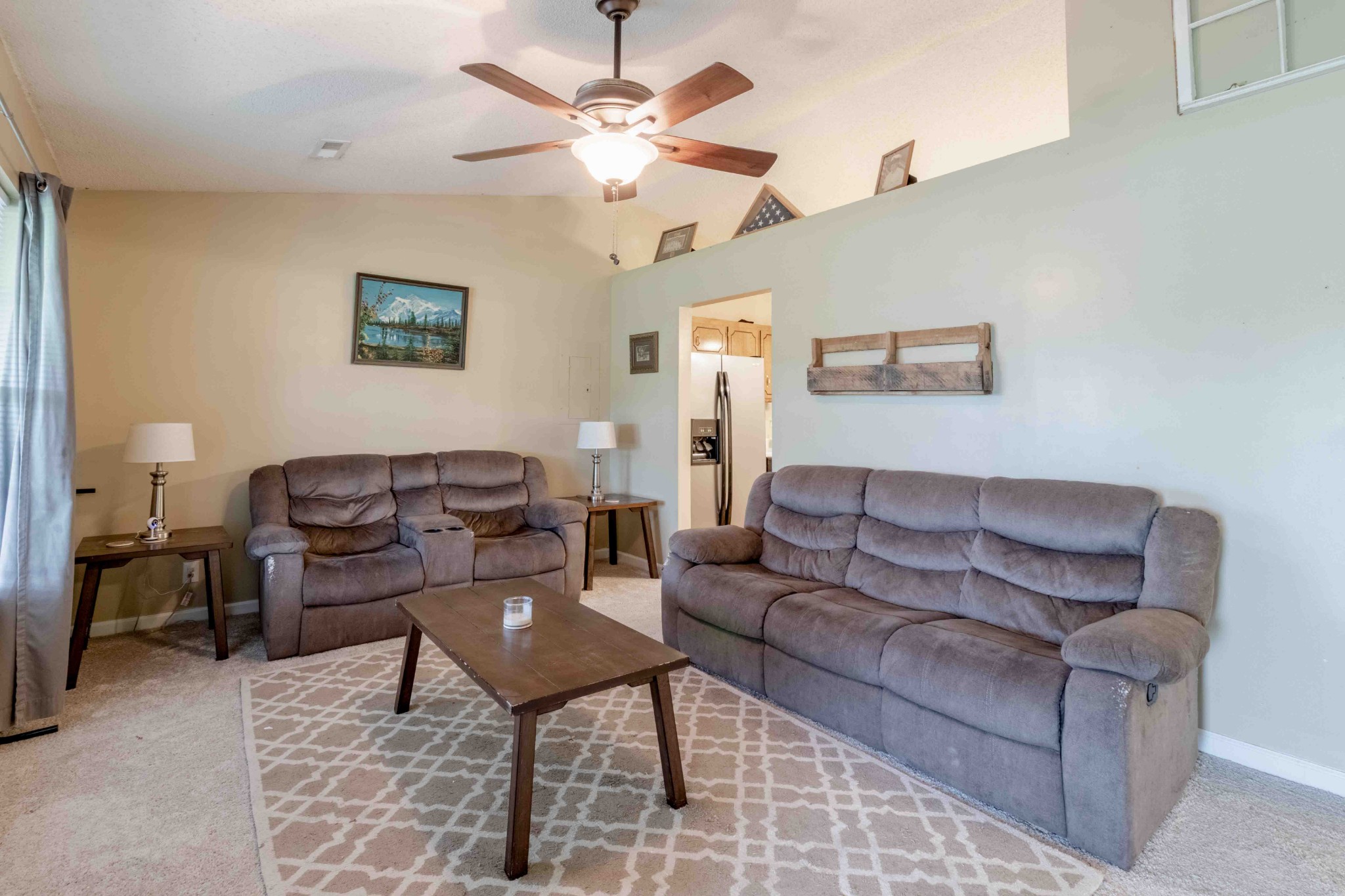 145 Bumpus Mill Road Oak Grove, KY 42262 - Photo 8 of 31 a living room with furniture a chandelier and a couch