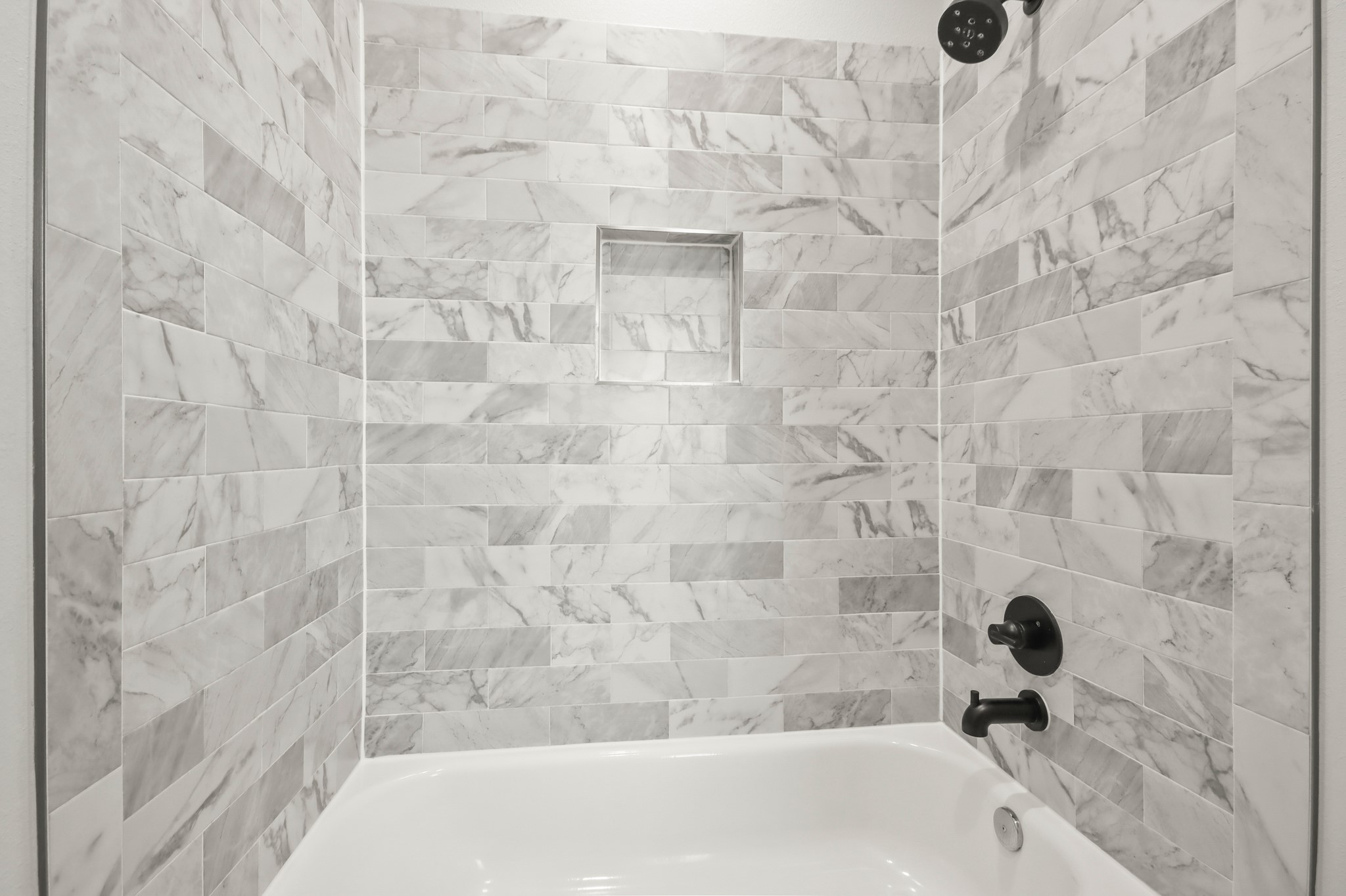 2105 Sam Wilson Street, Unit E Houston, TX 77020 - Photo 14 of 30 a bathroom with a bathtub