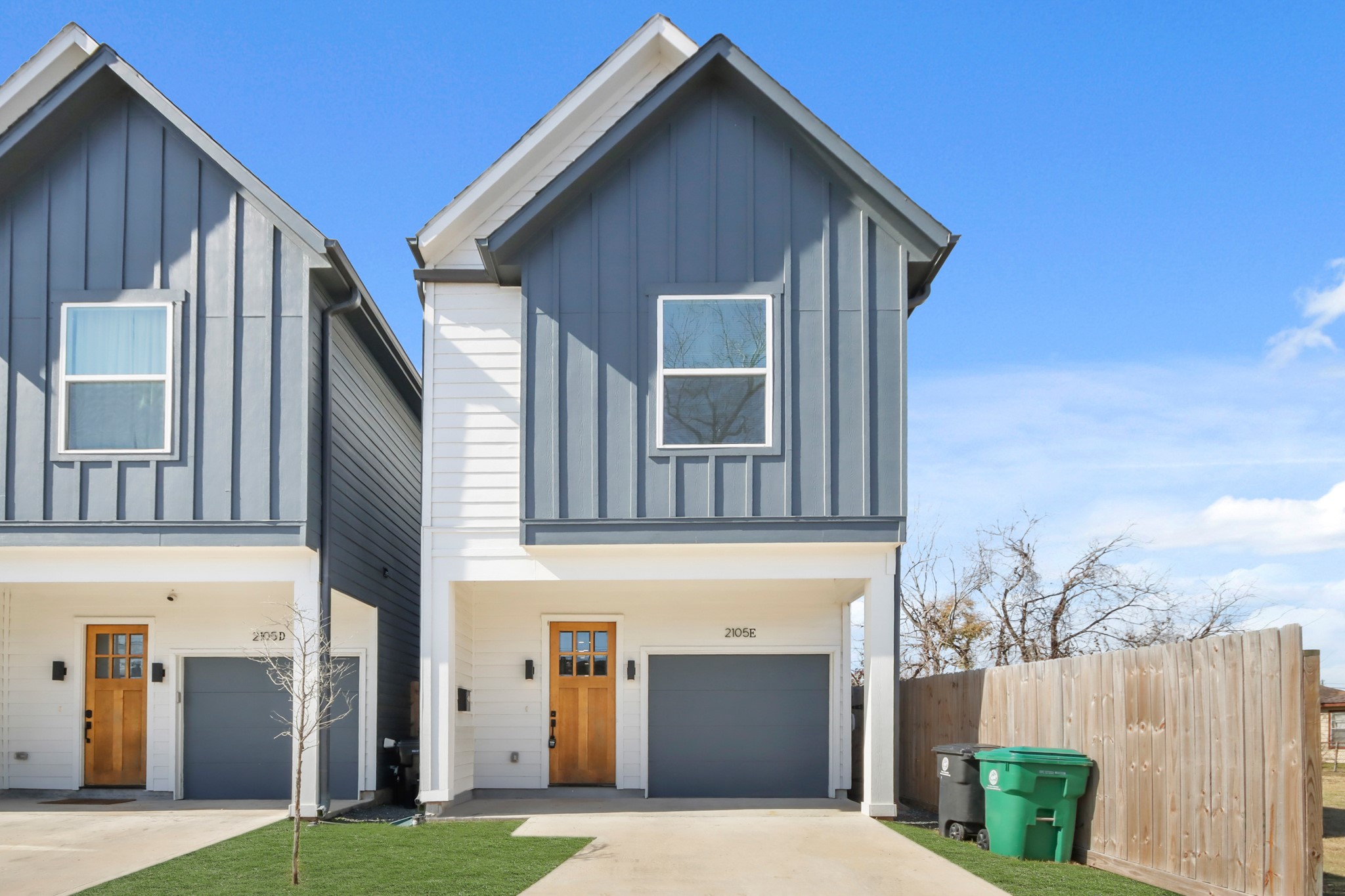 2105 Sam Wilson Street, Unit E Houston, TX 77020 - Photo 2 of 30 a front view of a house with garage