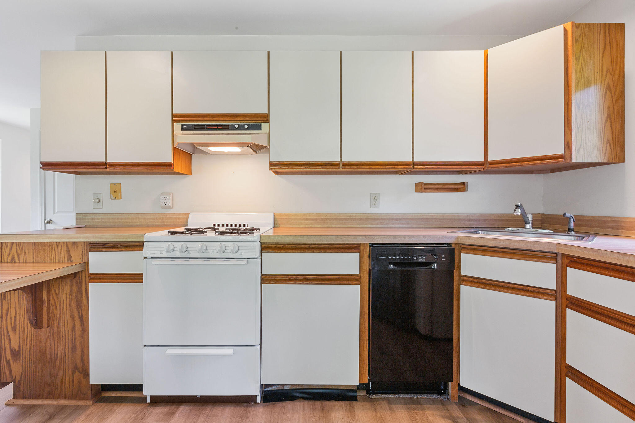 48 Namequoit Road Orleans, MA 02653 - Photo 33 of 97 a kitchen with stainless steel appliances granite countertop a sink and a stove