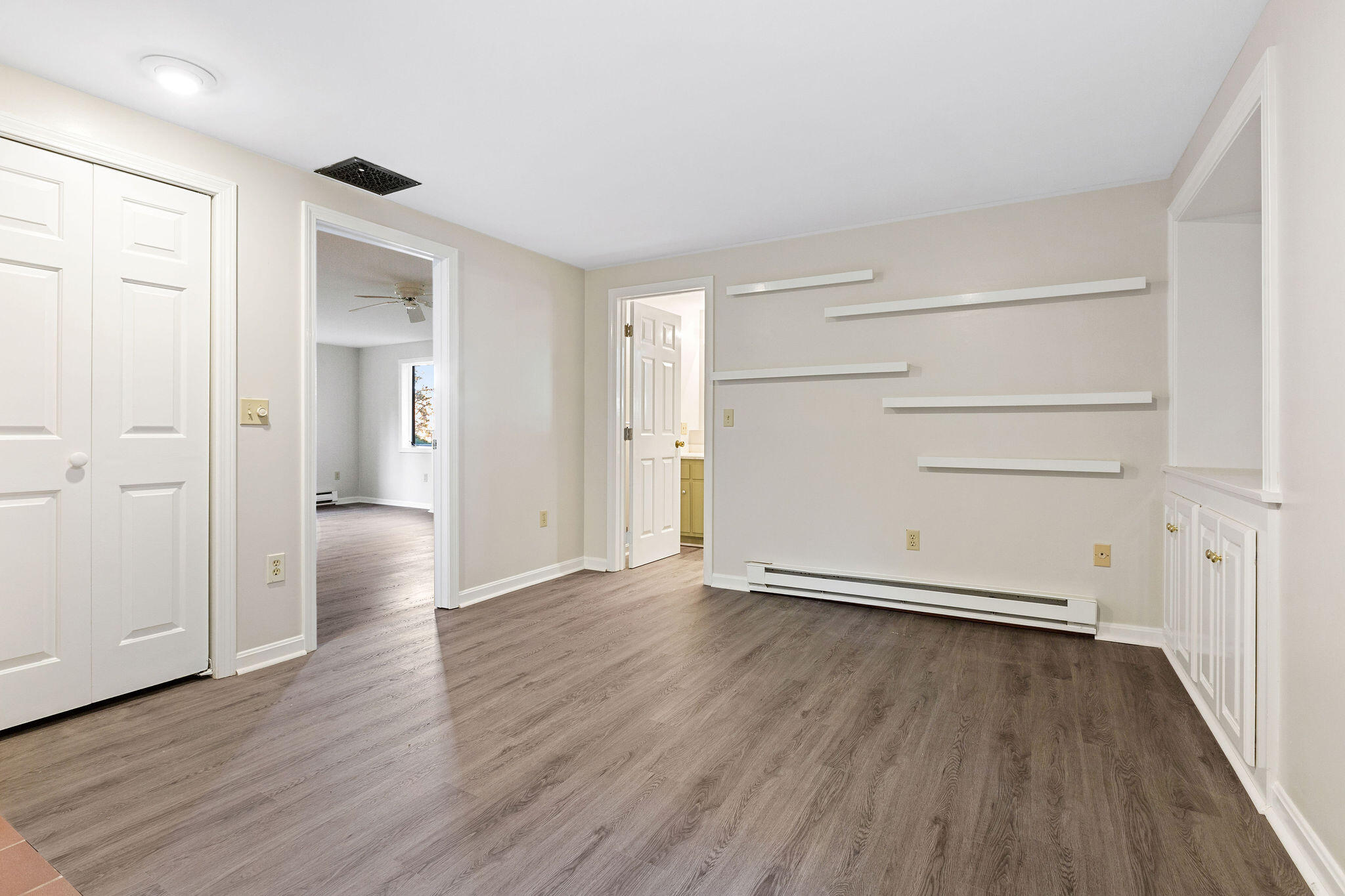 48 Namequoit Road Orleans, MA 02653 - Photo 44 of 97 an empty room with wooden floor