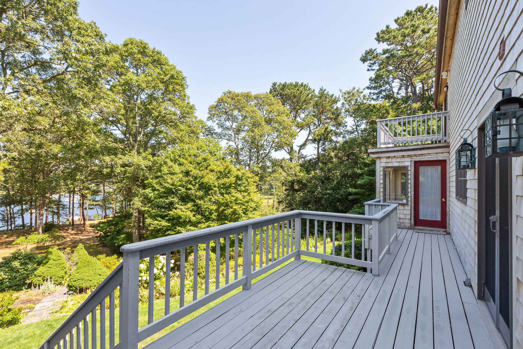 48 Namequoit Road Orleans, MA 02653 - Photo 87 of 97 a view of a two chairs in the balcony