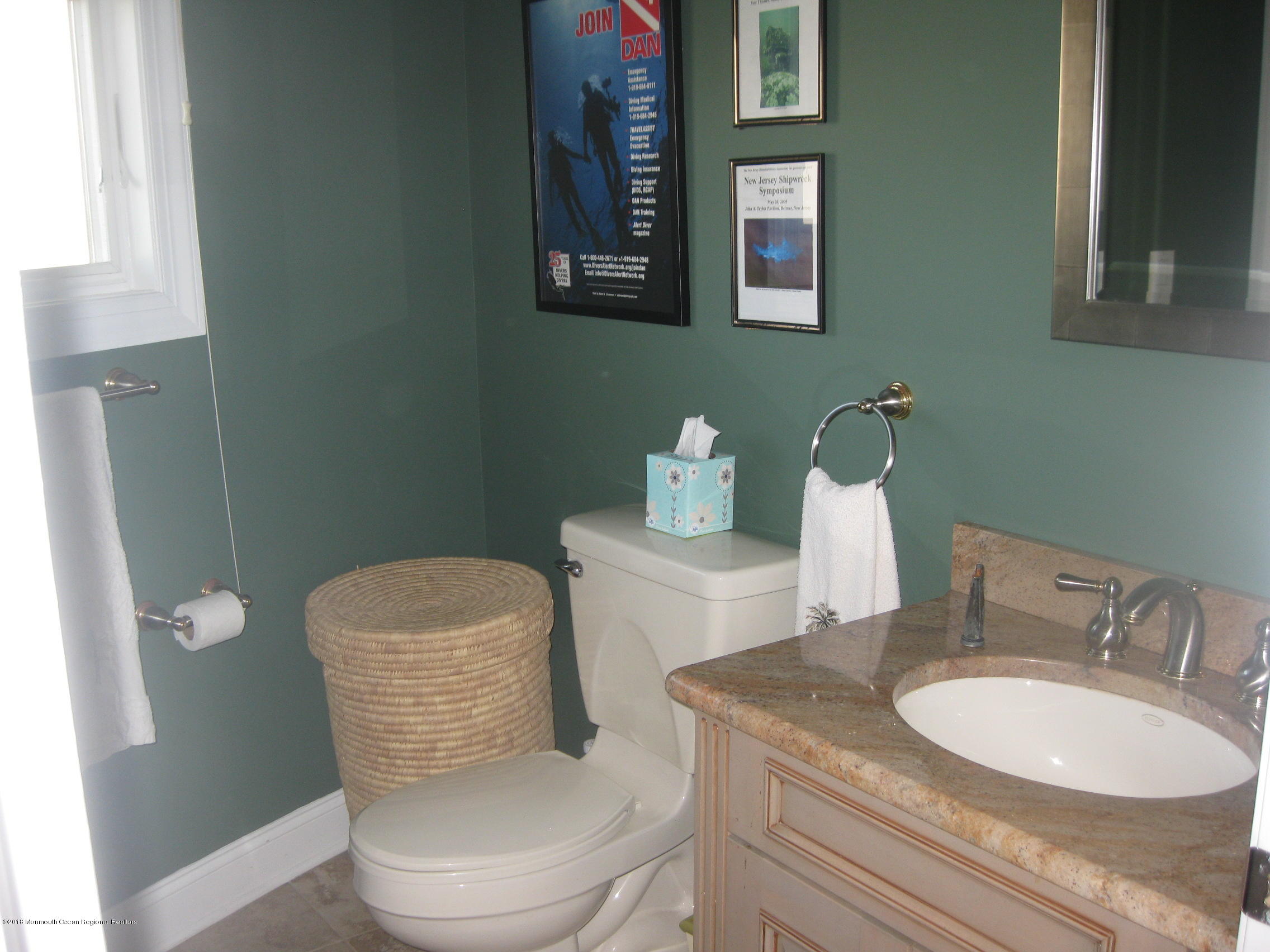 3436 Ocean Road Lavallette, NJ 08735 - Photo 14 of 24 a bathroom with a toilet a sink and mirror