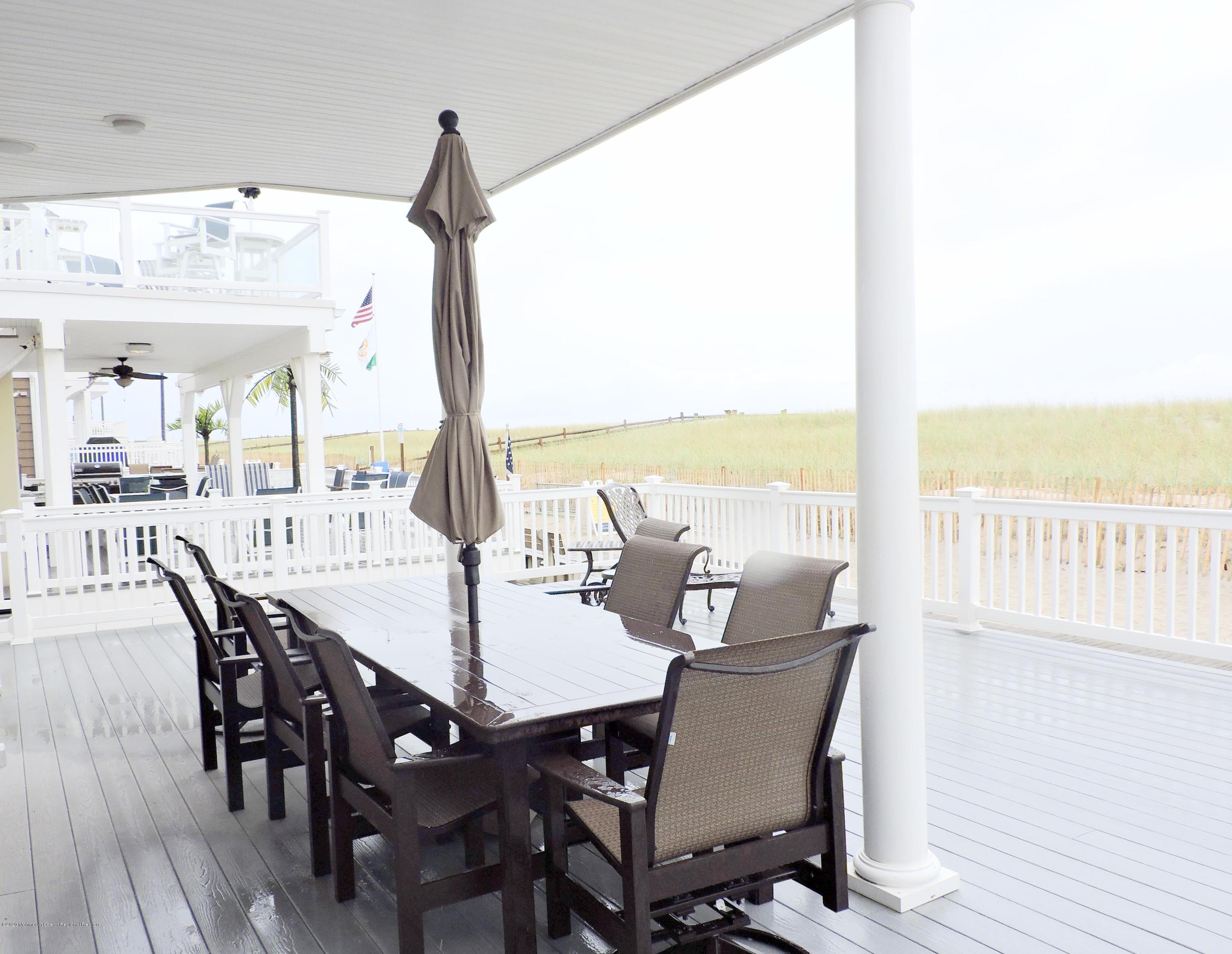3436 Ocean Road Lavallette, NJ 08735 - Photo 17 of 24 a view of a dining room with furniture window and wooden floor