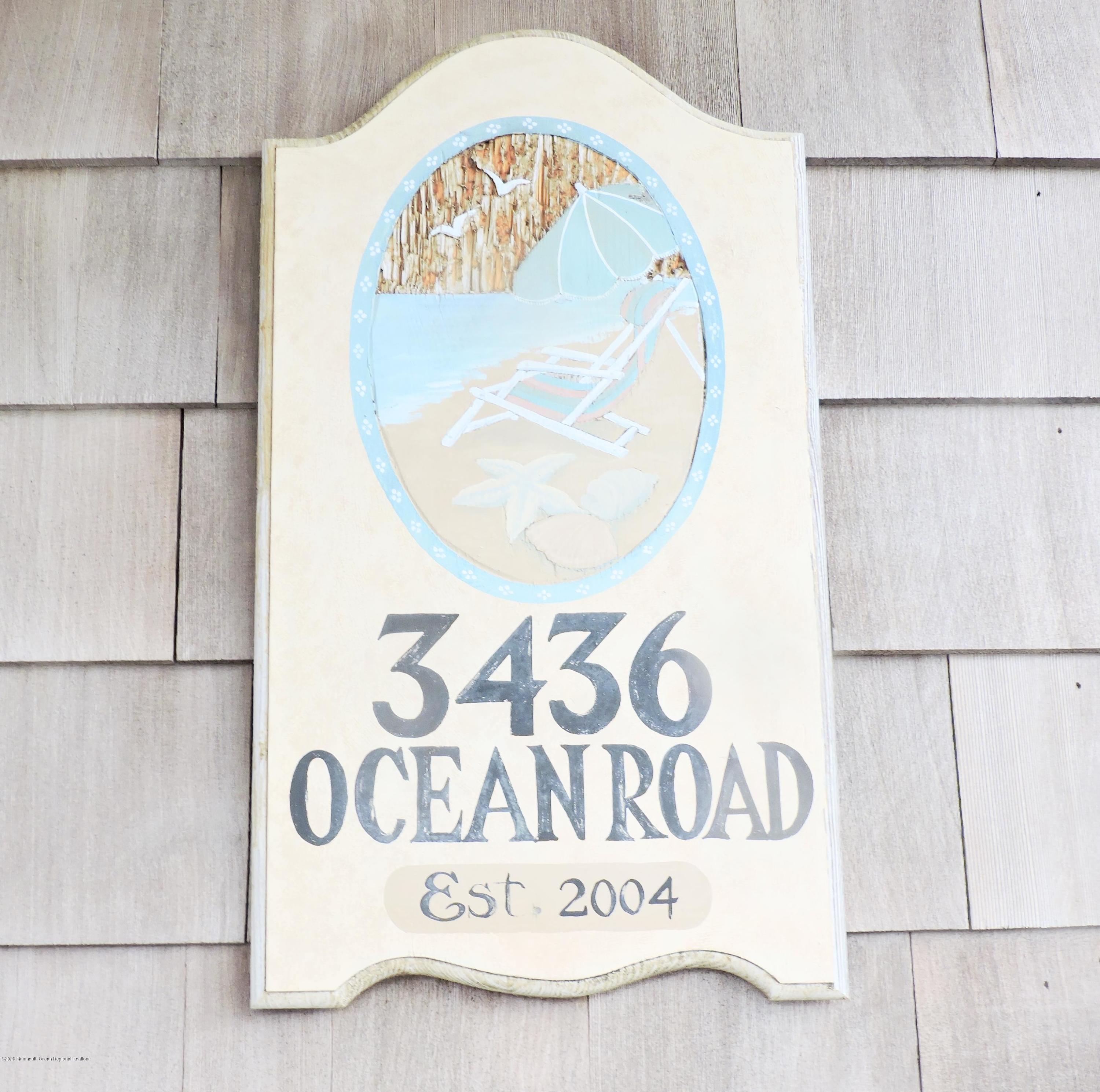 3436 Ocean Road Lavallette, NJ 08735 - Photo 20 of 24 a sign that is on a wall