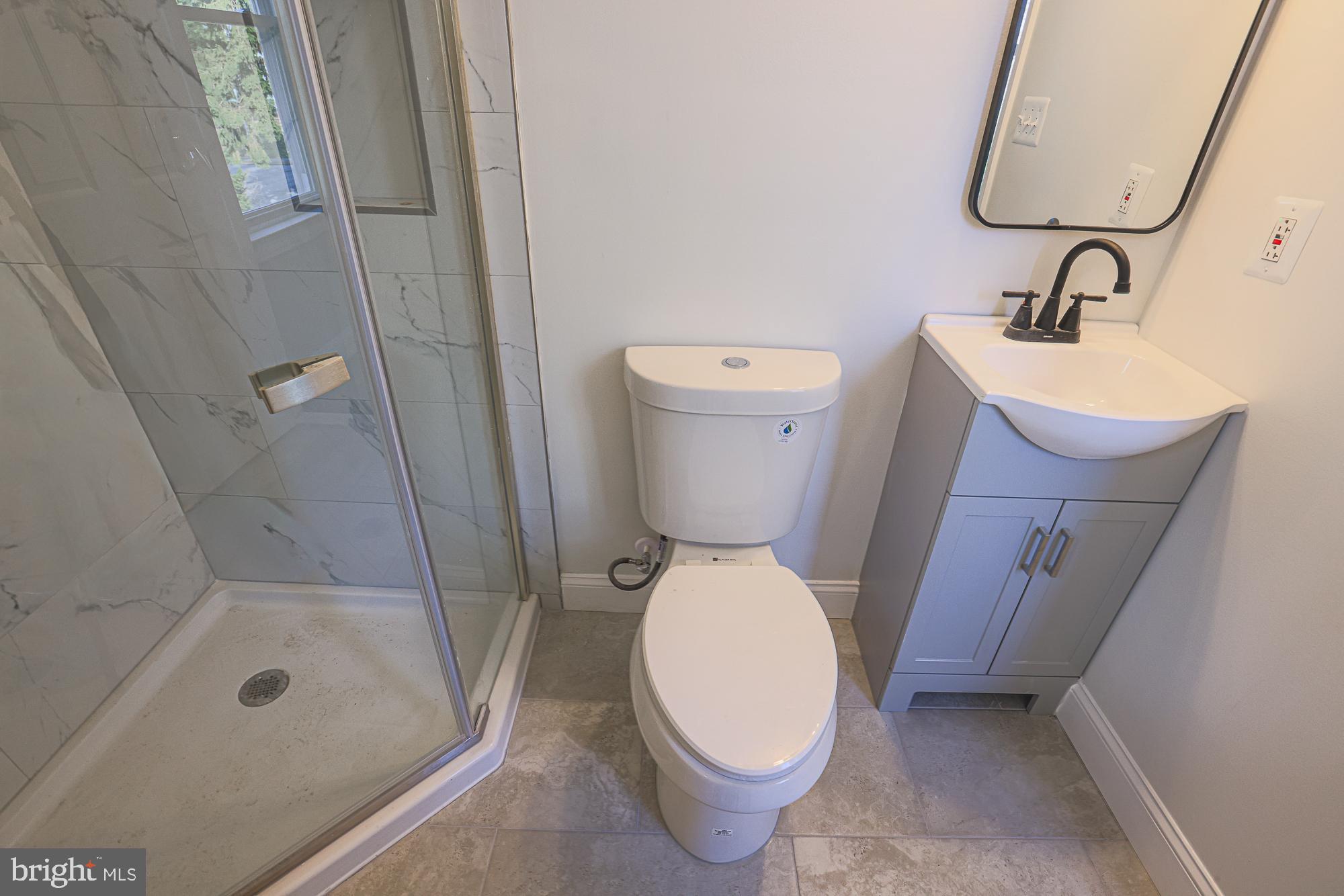 2606 Queen Anne Road Baltimore, MD 21216 - Photo 76 of 92 Modern bathroom with sleek fixtures.