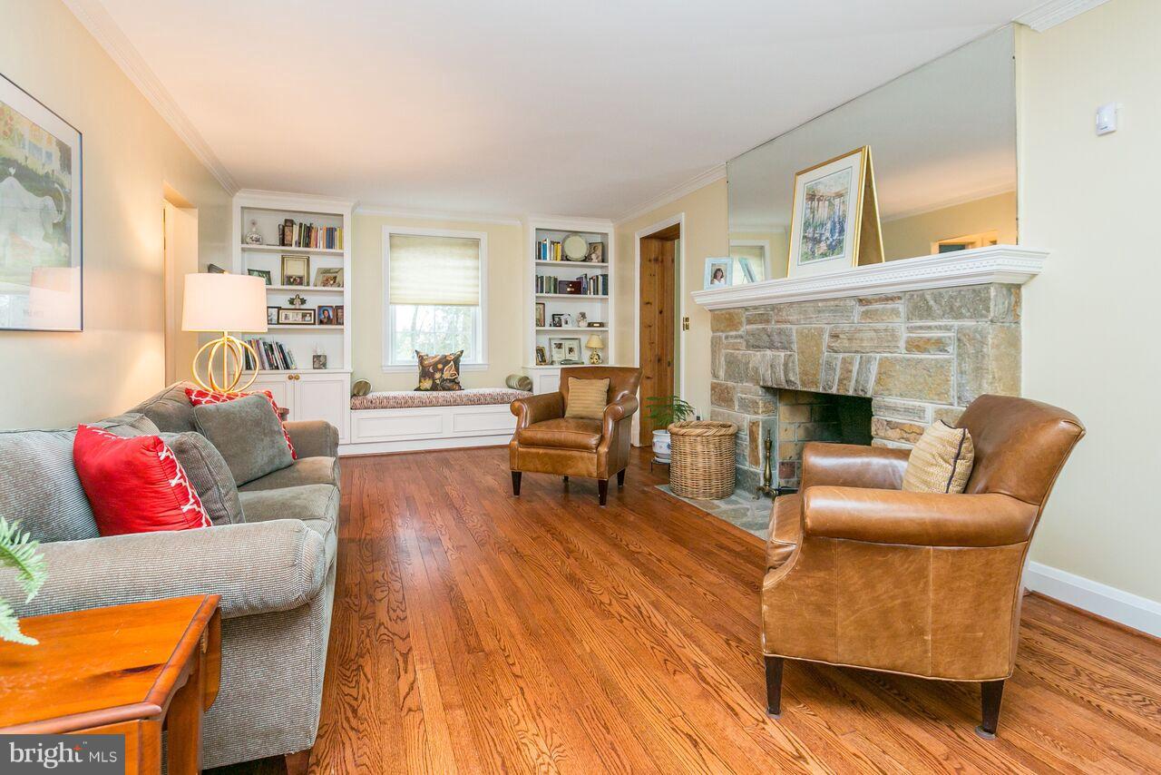 616 Hastings Road Baltimore, MD 21286 - Photo 2 of 23 a living room with furniture and a fireplace