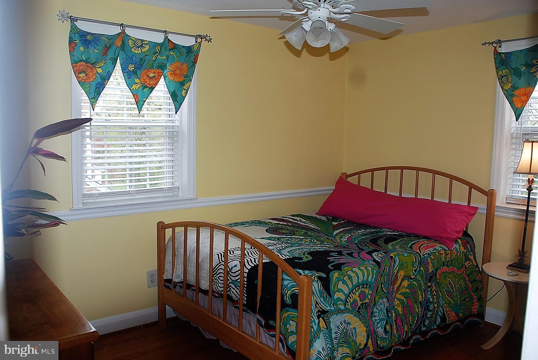 616 Hastings Road Baltimore, MD 21286 - Photo 15 of 23 a view of a bedroom with a bed and a window