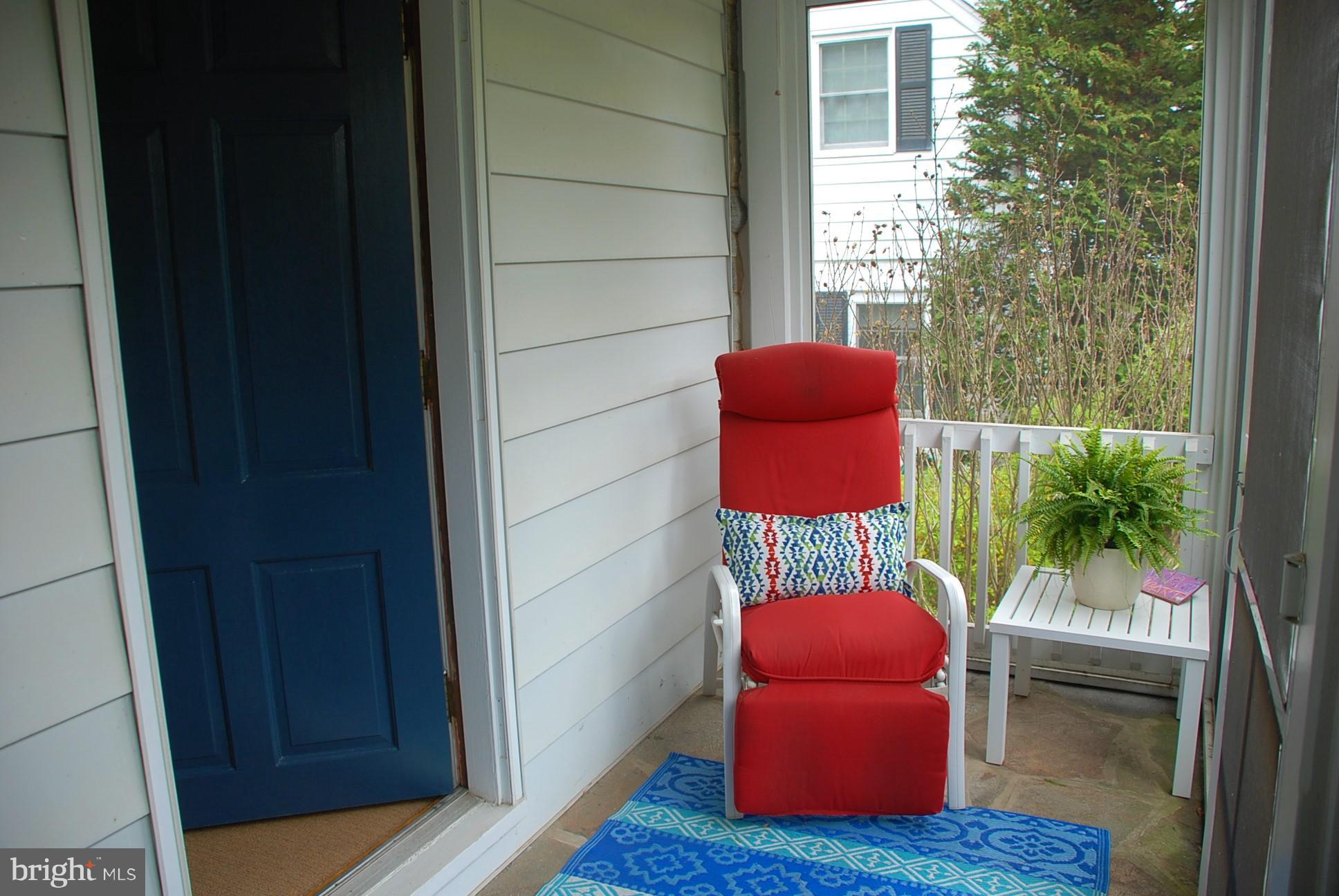616 Hastings Road Baltimore, MD 21286 - Photo 19 of 23 a view of a deck with chair and table