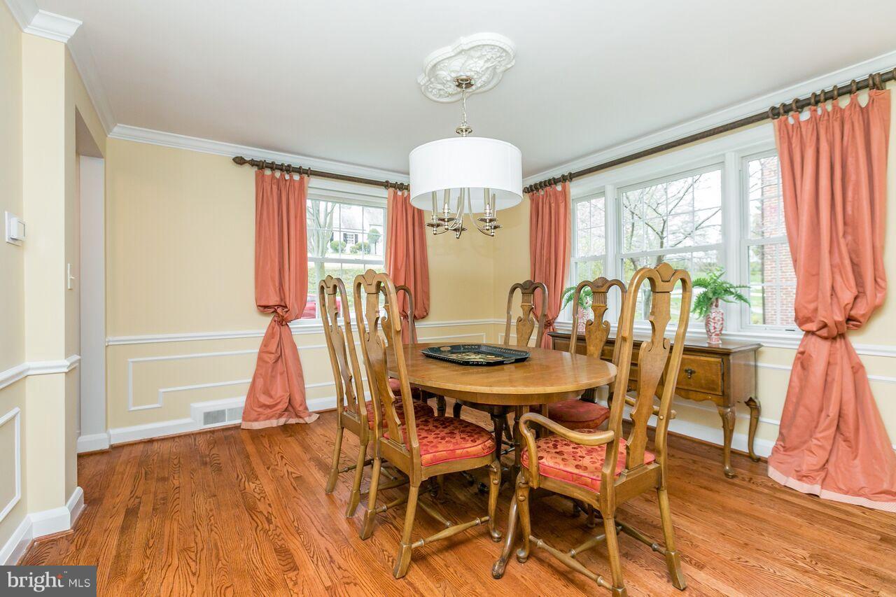 616 Hastings Road Baltimore, MD 21286 - Photo 4 of 23 a view of a dining room with furniture window and wooden floor