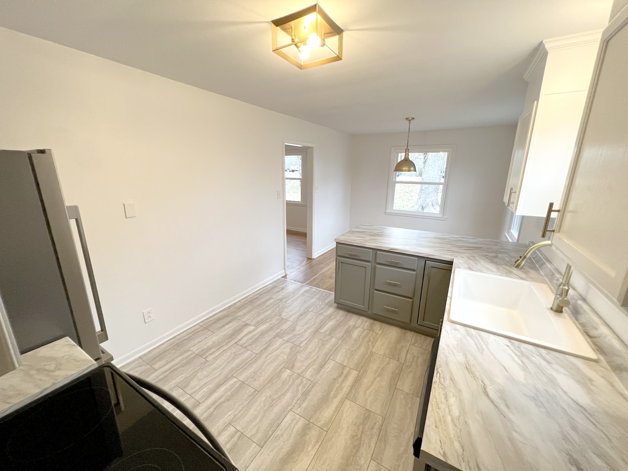 505 High Point Road Clarksville, TN 37042 - Photo 15 of 39 a living room with a bed furniture and a large window