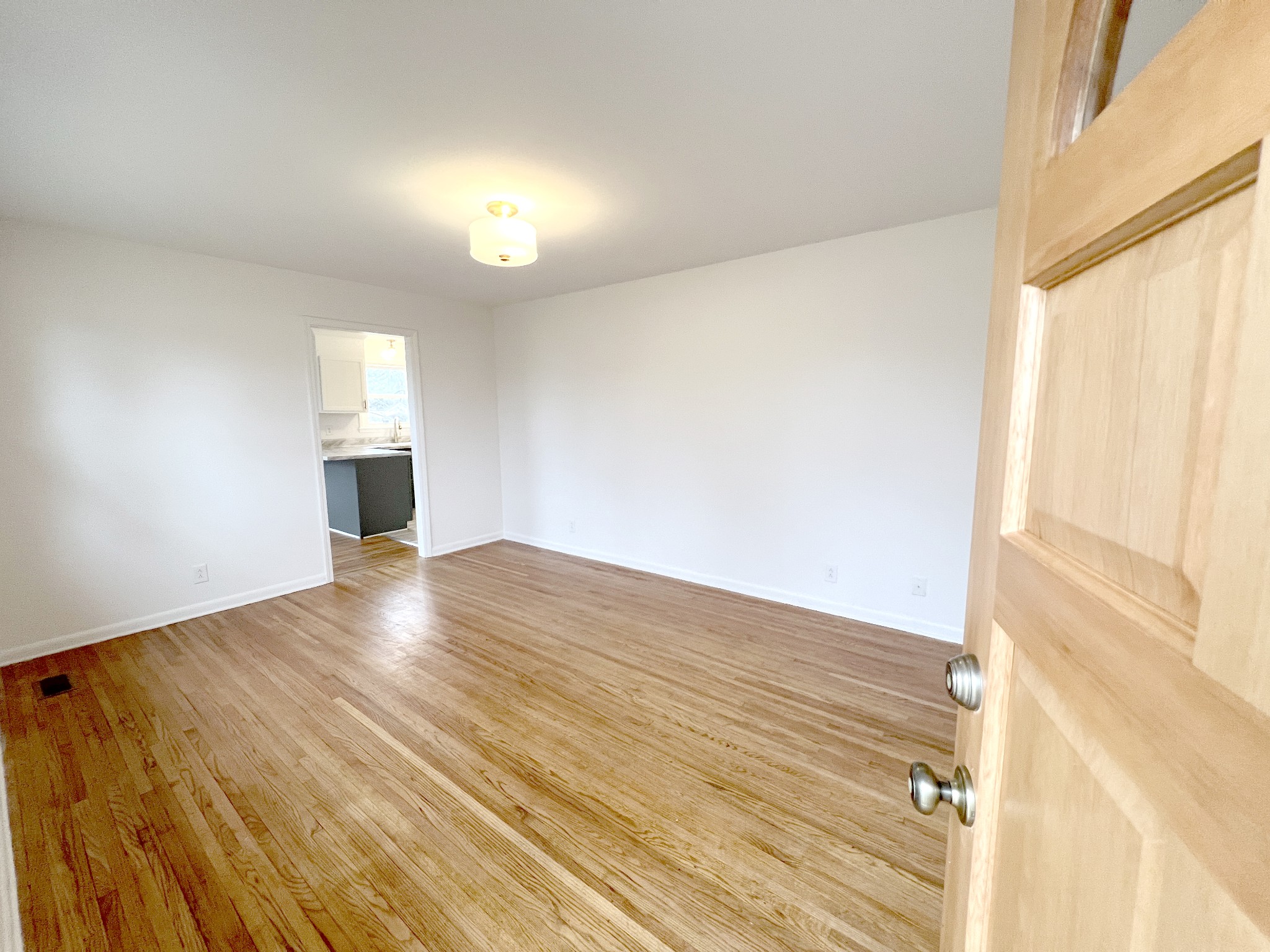 505 High Point Road Clarksville, TN 37042 - Photo 17 of 39 a view of empty room with wooden floor and fan