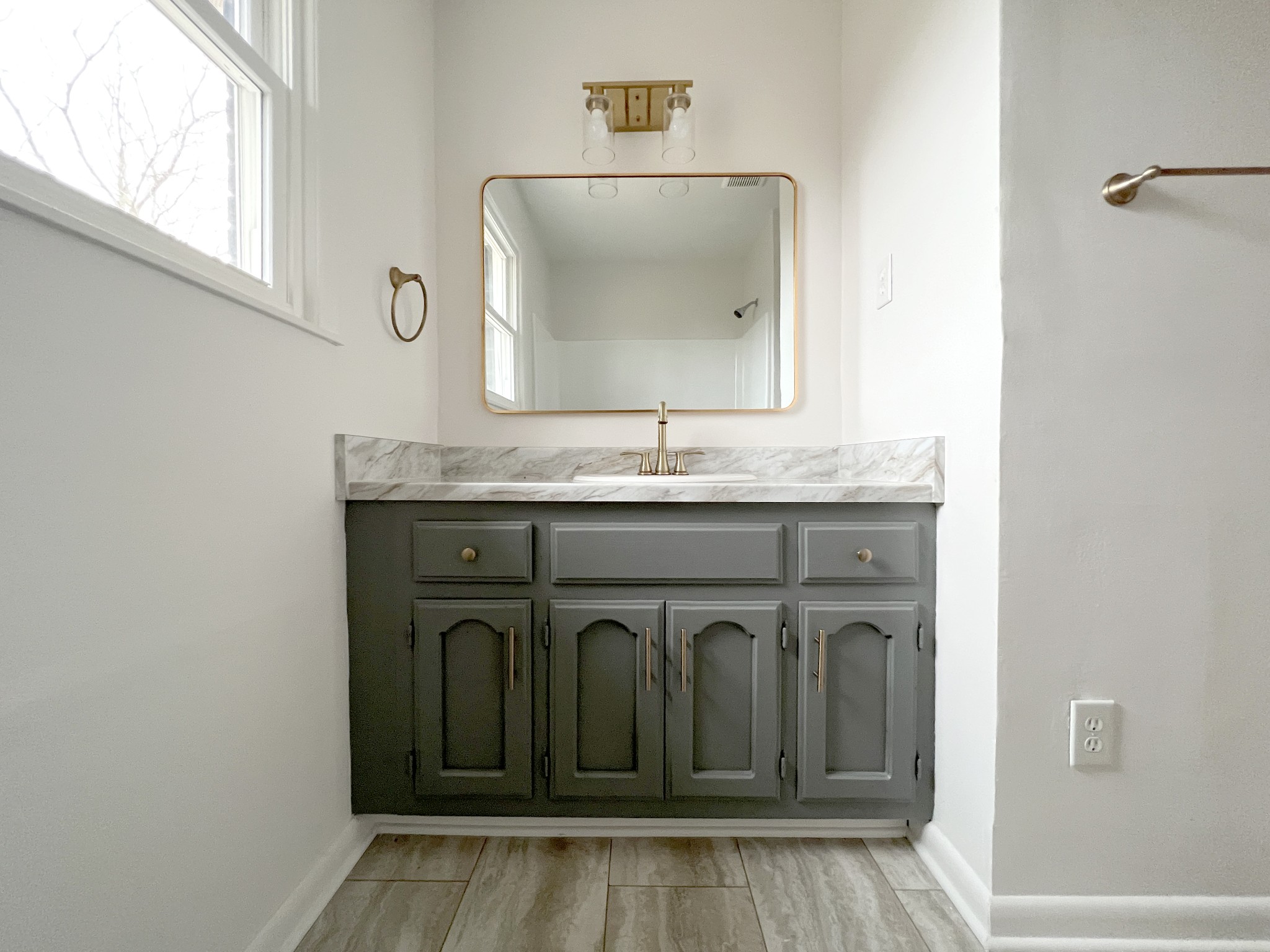 505 High Point Road Clarksville, TN 37042 - Photo 30 of 39 a bathroom with a granite countertop sink and a mirror