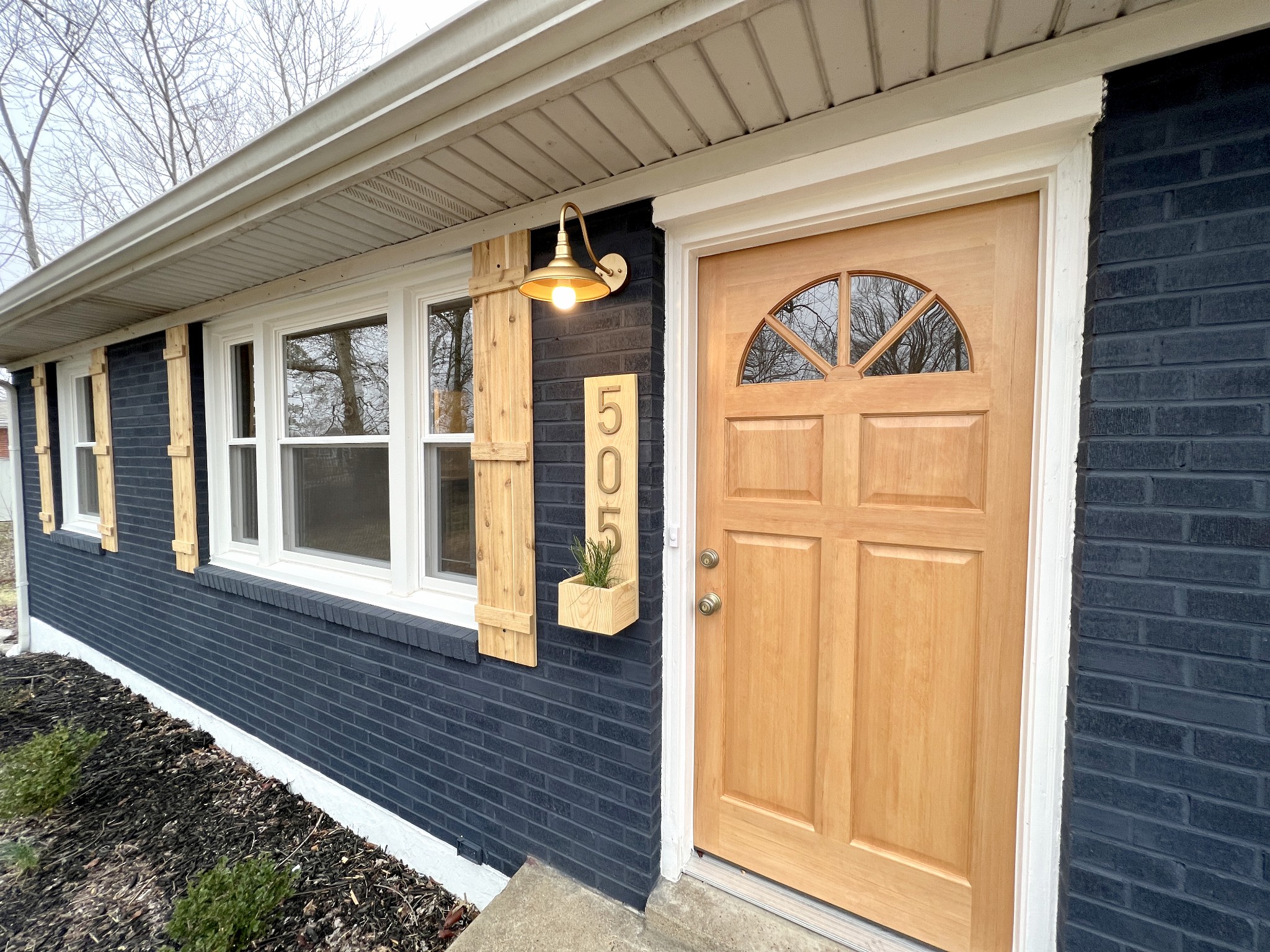 505 High Point Road Clarksville, TN 37042 - Photo 5 of 39 a front view of a house with a large window