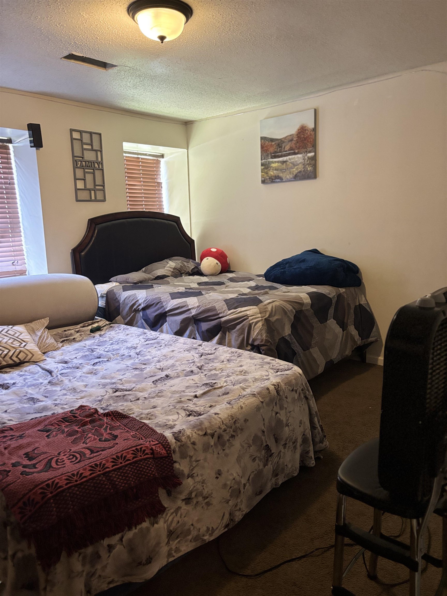3626 Outland Road, Unit 86 Memphis, TN 38118 - Photo 14 of 24 a bedroom with two beds and painting on the wall