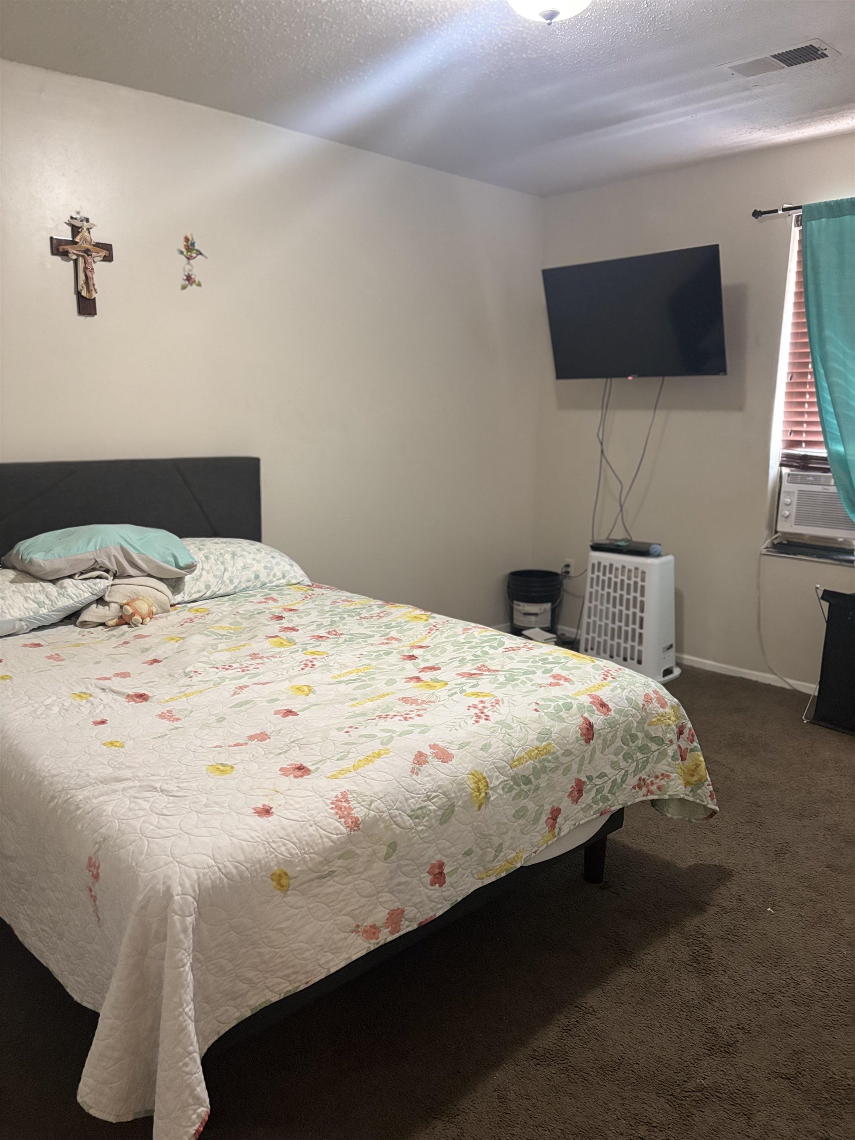 3626 Outland Road, Unit 86 Memphis, TN 38118 - Photo 17 of 24 a bedroom with a bed and a flat screen tv