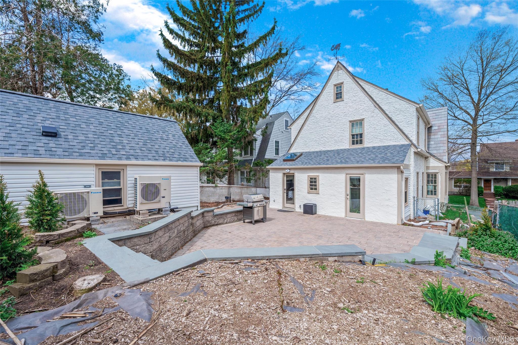 340 Manor Road Queens, NY 11363 - Photo 22 of 34 Baxkyard facing House