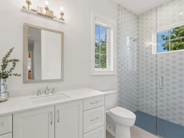 a view of a swimming pool with a yard