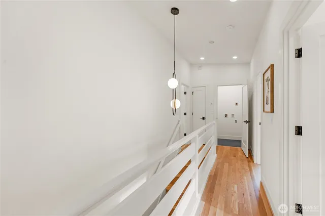 a bedroom with a bed and a table