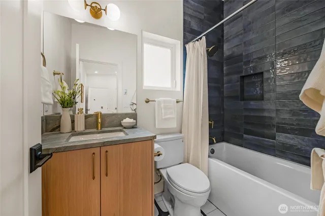 a aerial view of multiple houses with a yard