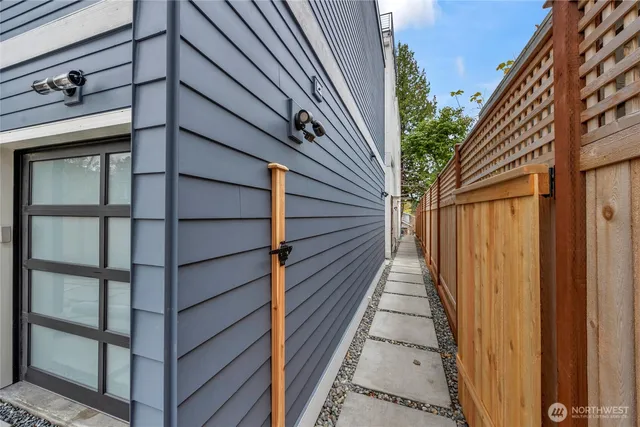 a balcony view with a glass door