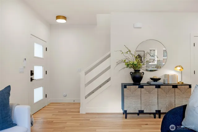 a view of hall way with furniture