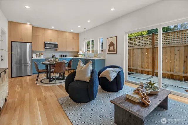 a living room with furniture and a table