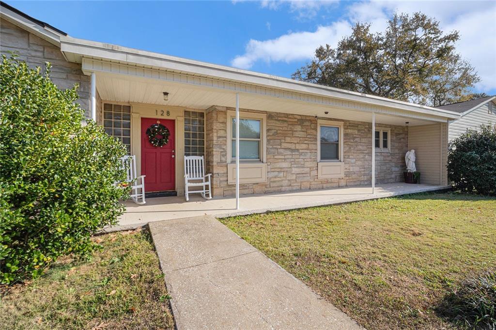 128 Highland Drive West Point, GA 31833 - Photo 2 of 22 a view of a house with backyard