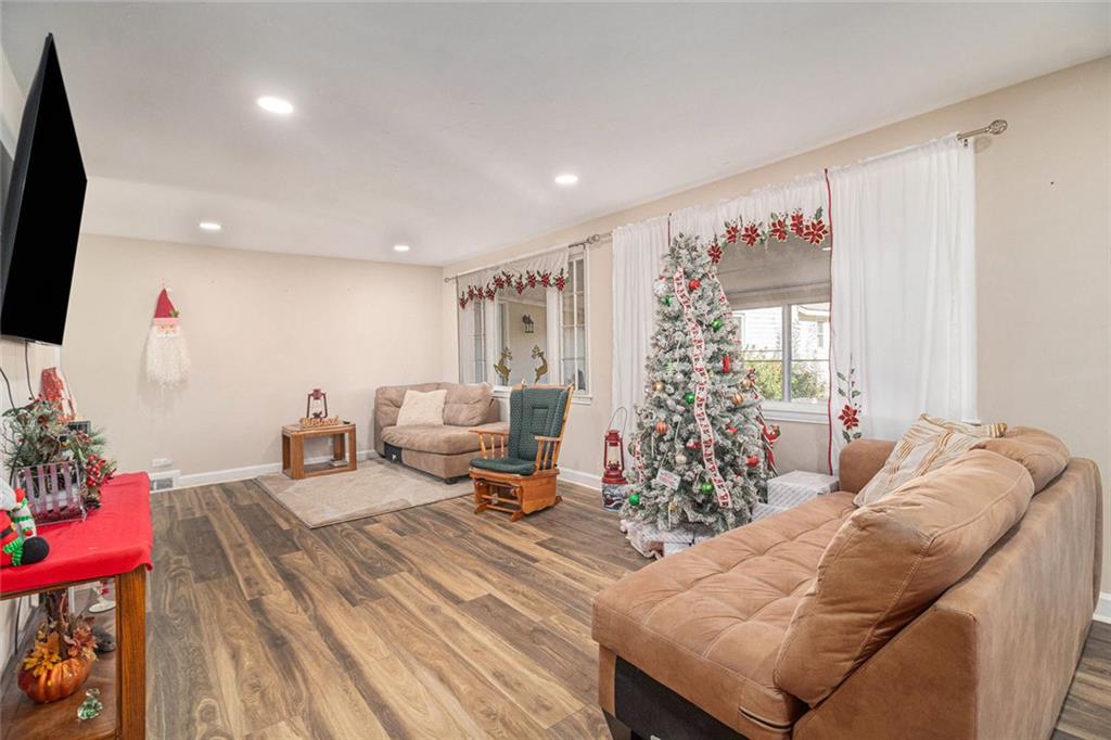 128 Highland Drive West Point, GA 31833 - Photo 3 of 22 a living room with furniture and a flat screen tv