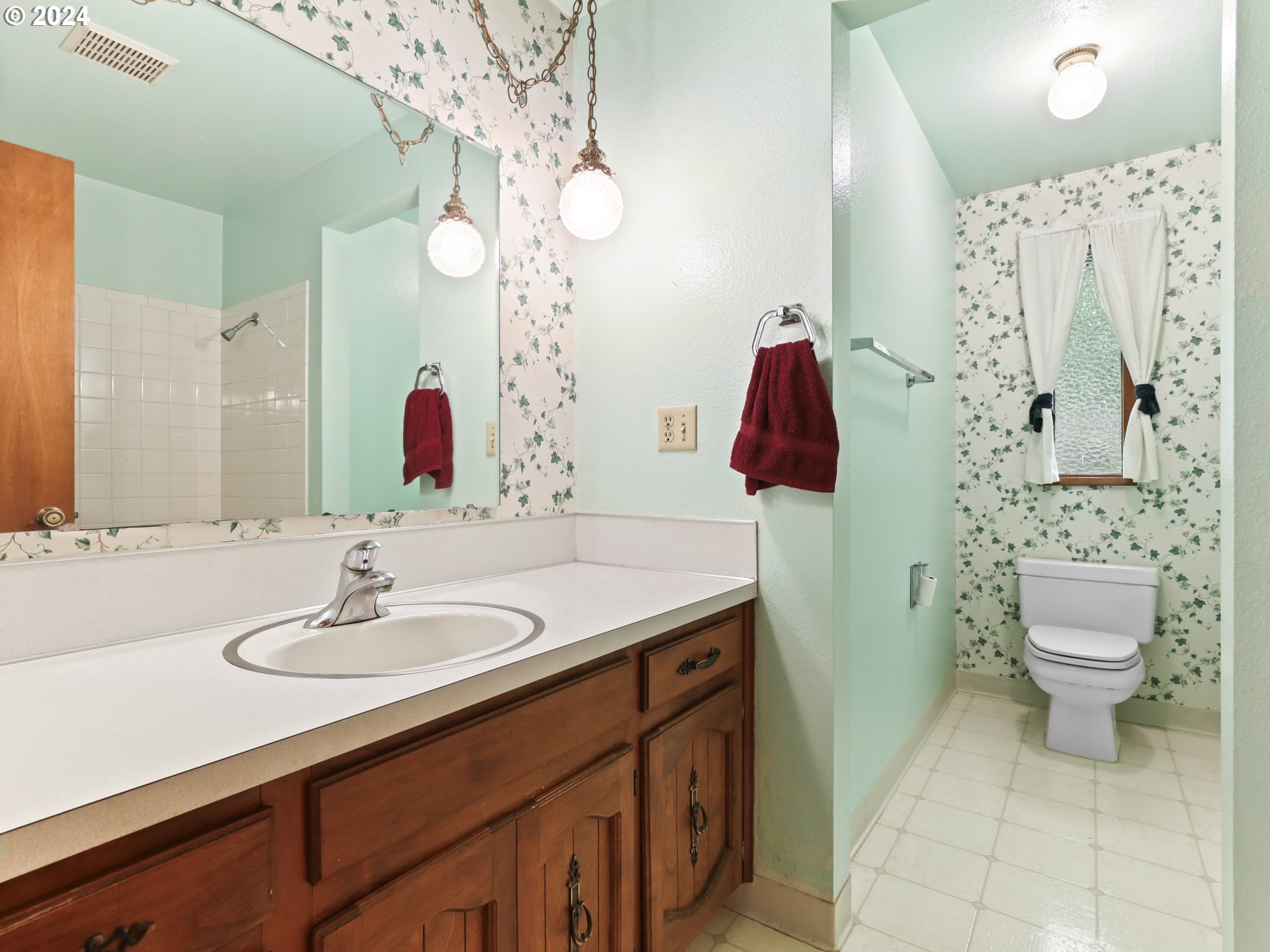 2002 Northwest 127th Street Vancouver, WA 98685 - Photo 19 of 33 a bathroom with a sink toilet and shower