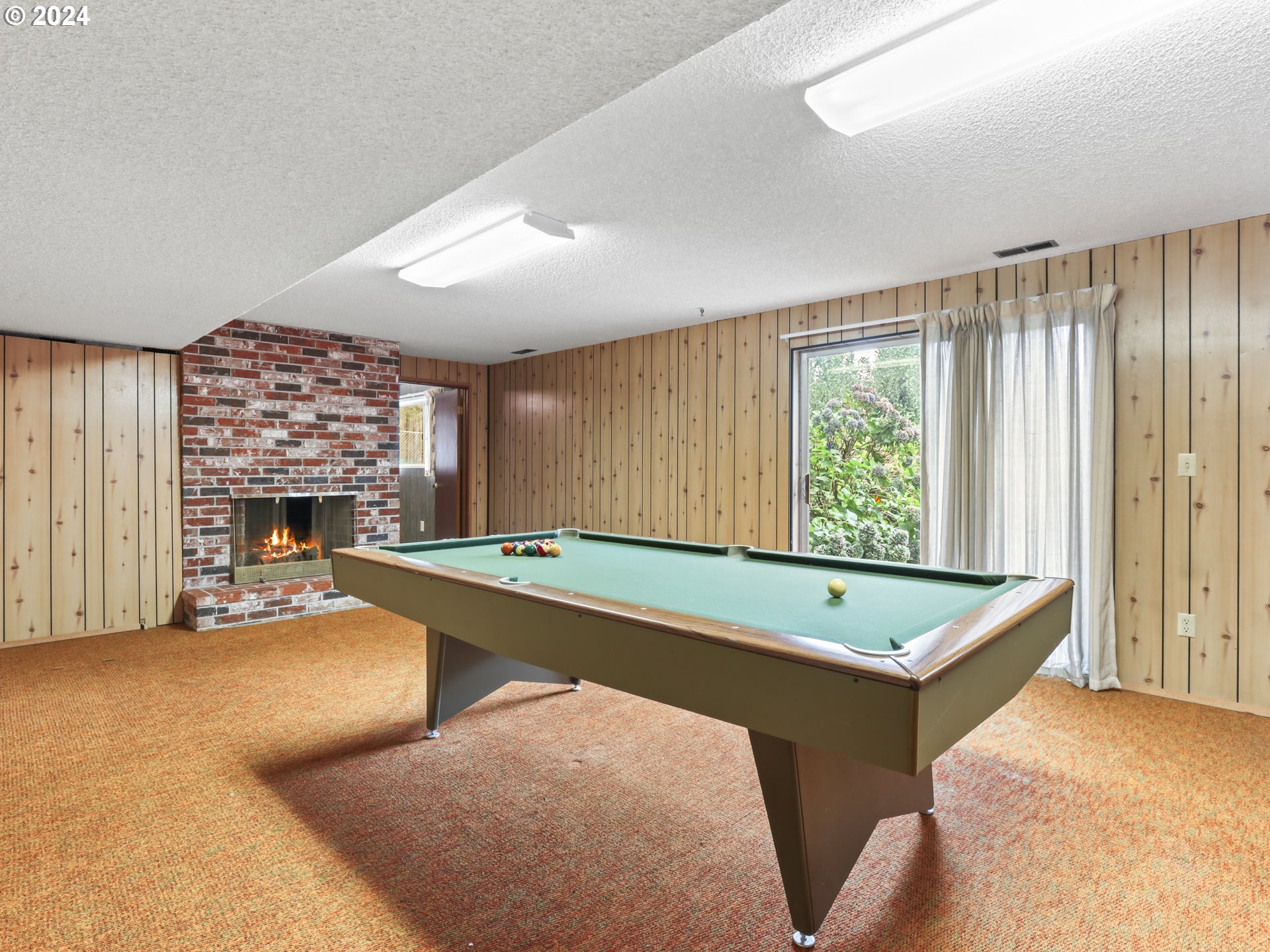 2002 Northwest 127th Street Vancouver, WA 98685 - Photo 23 of 33 a pool table sitting in the middle of a room
