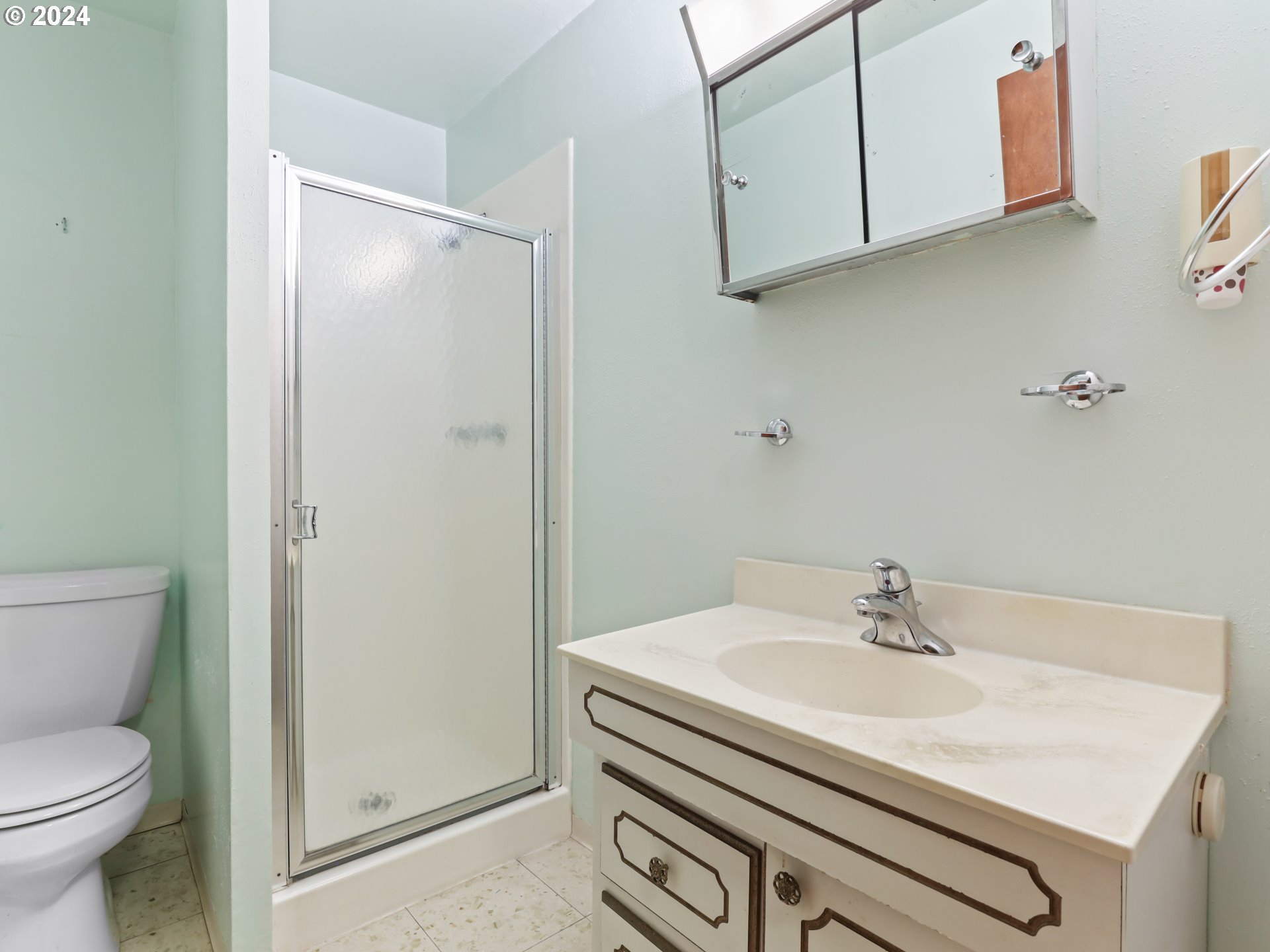 2002 Northwest 127th Street Vancouver, WA 98685 - Photo 26 of 33 a bathroom with a sink toilet and vanity