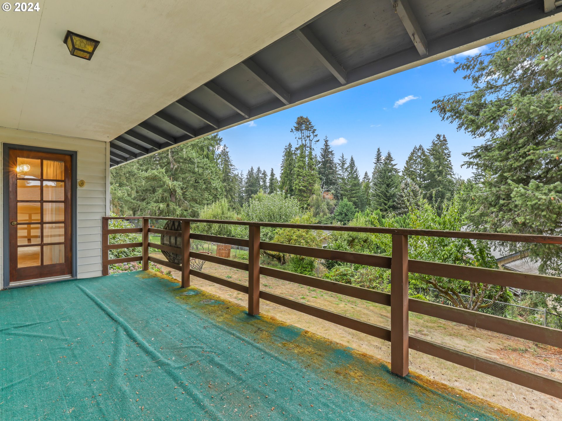2002 Northwest 127th Street Vancouver, WA 98685 - Photo 10 of 33 a view of a porch with furniture and a yard