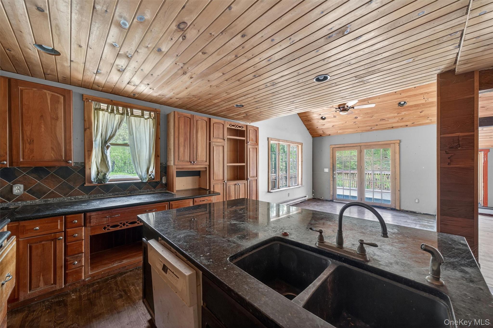 360 Buttermilk Falls Road Warwick, NY 10990 - Photo 14 of 30 a kitchen with granite countertop a sink and a counter top space