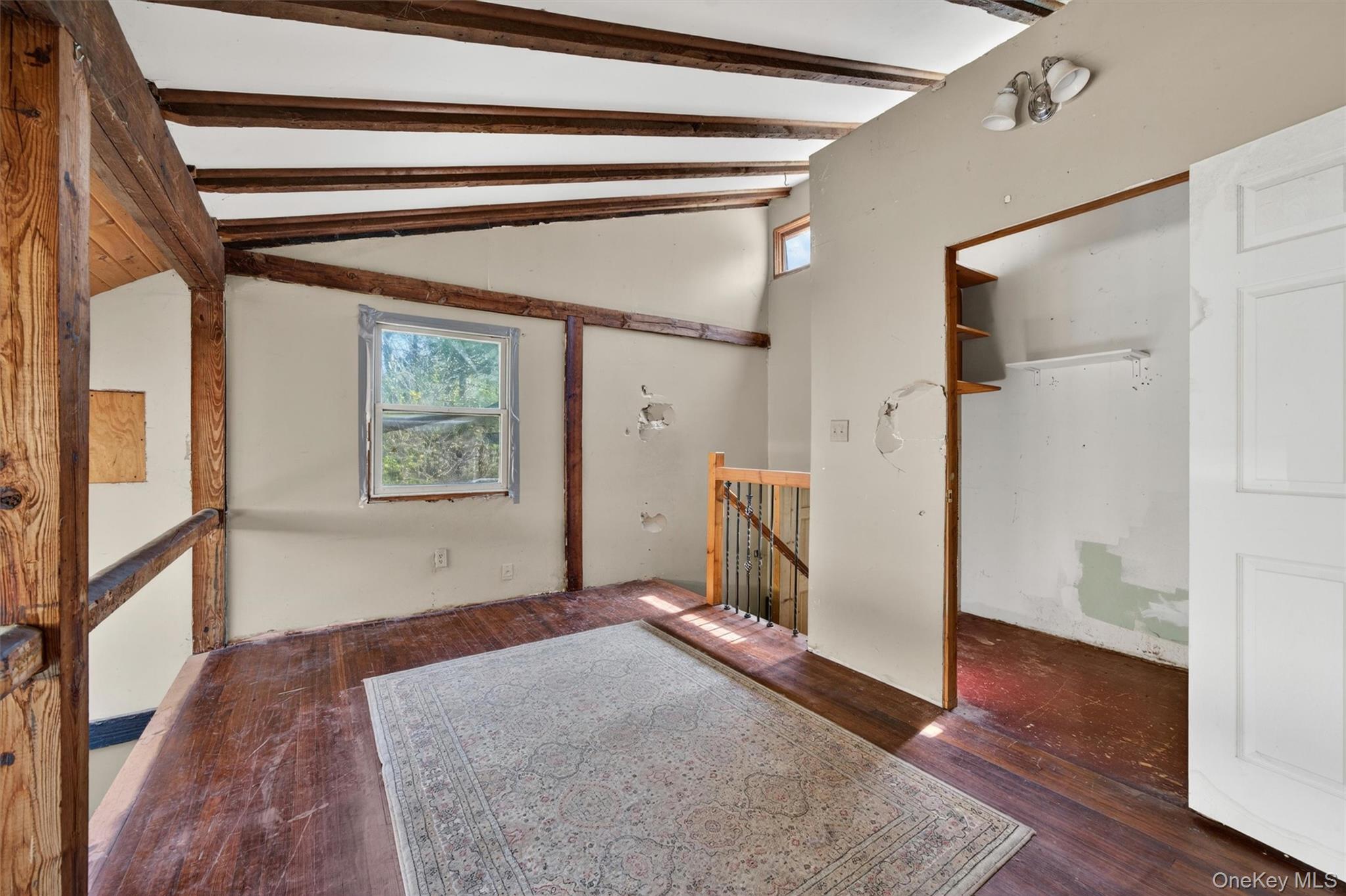 360 Buttermilk Falls Road Warwick, NY 10990 - Photo 18 of 30 a view of a room with wooden floor and a window