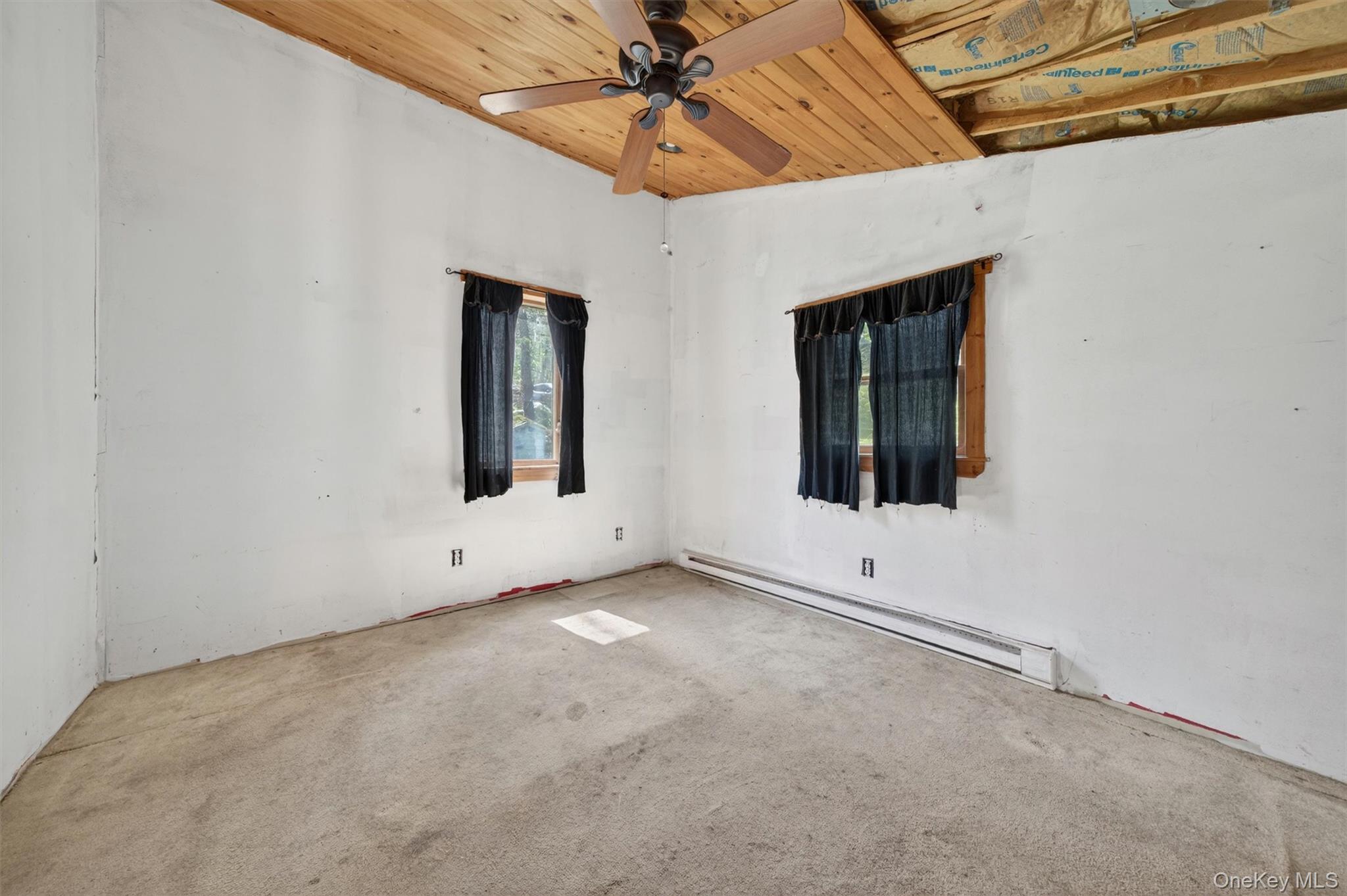 360 Buttermilk Falls Road Warwick, NY 10990 - Photo 21 of 30 an empty room with windows