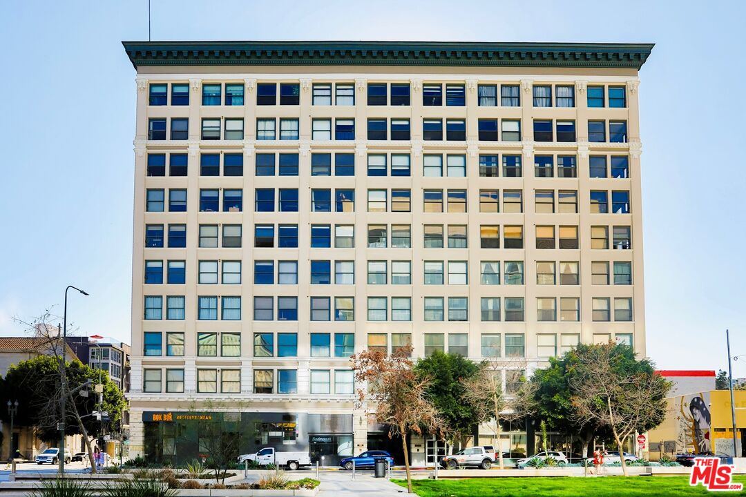 a front view of a building with street view