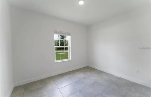 an empty room with a window