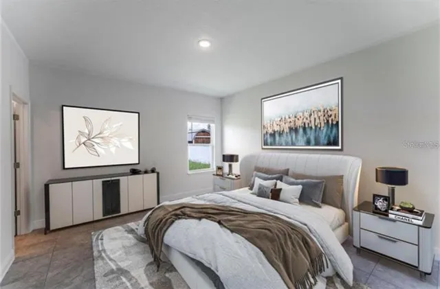 a bedroom with bed and window