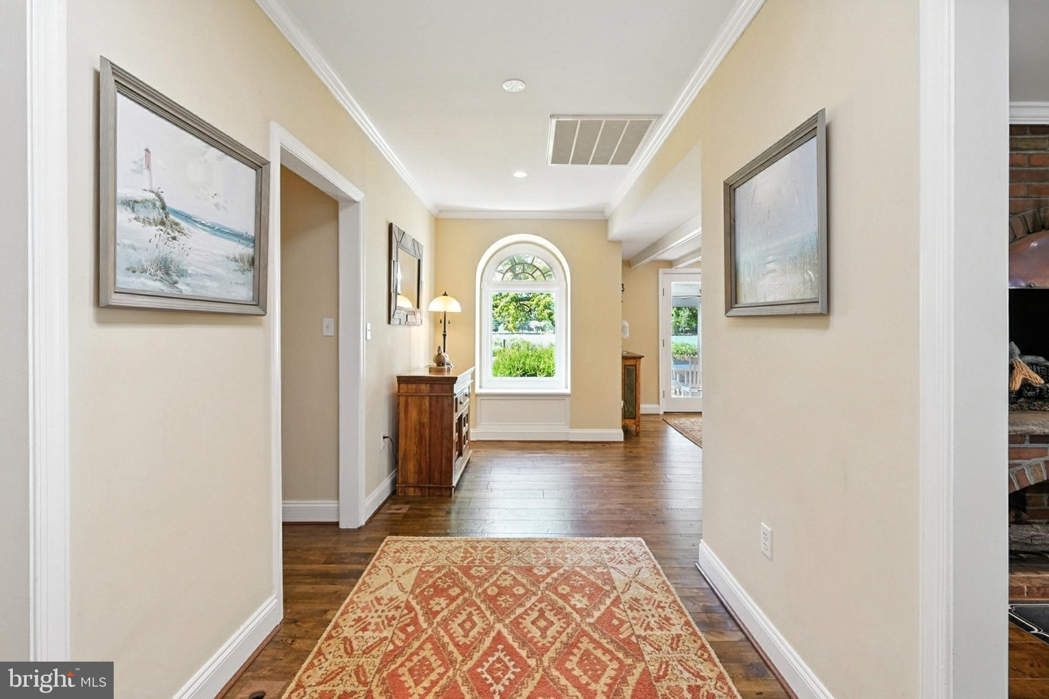 7312 Solitude Road St. Michaels, MD 21663 - Photo 8 of 43 a view of an entryway with wooden floor